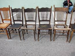 a leather seat in an antique chair