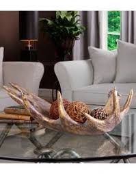 You don't want giant coffee table books paired with a tiny 2 oz. Wine Cabinet Coffee Table Fruit Basket Bowl Creative Resin Antlers Fruit Plate Household Decoration Wine Rack Suitable For Living Room Kitchen Dining Home