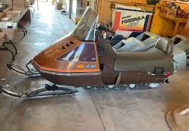 Image result for Orange 1973 Snowmobile