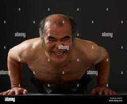 Shirtless mature man doing push ups Stock Photo - Alamy