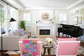Bohemian formal living room in london with pink walls, dark hardwood flooring and a standard fireplace. Colorful And Eclectic Living Room Klassisch Modern Wohnbereich Orange County Von Studio Mcgee Houzz