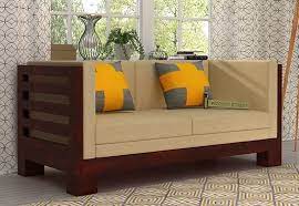 Hizen 2 Seater Wooden Sofa With Mahogany Finish Reflects Elegant Style And Beautifies The Space The Snug Wooden Sofa Designs Sofa Set Wooden Sofa Set Designs