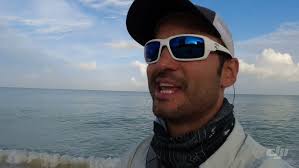 Man jumping off Naples Pier at Sunset