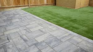 Perfect grass is asked to lay artificial grass on all types of surfaces both indoors and outdoors. Historic Flag Slate Paving Natural Paving With A Modern Design And With Namgrass Enigma Artificial Grass Too M Artifical Grass Garden Design Artificial Grass