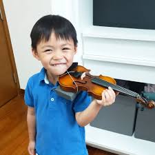 LVL Music Academy - Singapore - Look at how happy he is! If your child is asking to learn the violin- act on it! When there is interest, there is motivation, there