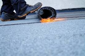 Roofwerks works with businesses to assess their commercial roofing needs. Flat Roof Installation With Propane Blowtorch During Construction Works With Roofing Felt Heating And Melting Bitumen Roofing Felt Roofing Felt Roofer Working Roofer Working Tool Waterproofing 292405662 Larastock