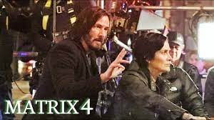 Matrix 4 Leaked Footage From Set Keanu Reeves And Carrie Anne Moss Riding Bike Youtube