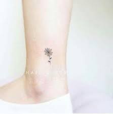 The white heart of the flowers contrasts with the pink and red outer shading of the tiny flowers tattoo. Tattoo Small Ankle Daisy 20 Super Ideas Toe Tattoos Tattoos Small Tattoos