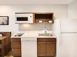 With flexible area, spacious living & discounted weekly rates you save around 30% or more on your each stay. Extended Stay Hotels With Kitchens Woodspring Suites In Room Kitchens