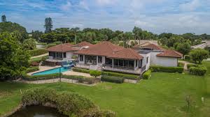 This desirable & expanded 400 model home boasts three bedrooms, great room area: Seagate Country Club At The Hamlet Homes For Sale Delray Beach Florida