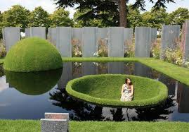 World Vision Garden Two Grass Domes Are Split By Water The Dome Above Water Represents Those Lucky Enoug Landscape Design Garden Design Pictures Pond Design