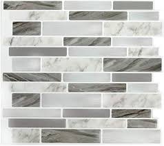 Groutable vinyl tiles are installed like standard vinyl, then the joints between the tiles are filled with grout to give the floor a convincing look of real ceramic or stone tile. Wall Dimension Easy Peel Stick 3d Vinyl Mosaic Grey Marble Tile For Kitchen And Bathroom Back Splash Border Set Of 4 Tile Sheets Wm 068c 3 13 Sf Decorative Tiles Home Decor Kalingauniversity Ac In
