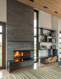 14 Inspirational Ideas For Storing Firewood In Your Home Freestanding Fireplace Contemporary Fireplace Modern Fireplace