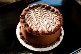 Spread 1/3 to 1/2 cup frosting over top of first layer to within about 1/4 inch of edge. Plain 8 Inch 2 Layer Round Cake With Flavored Buttercream Filling Trefzger S Bakery