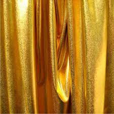 This stunning range of discounted gold fabric offer an elegant and luxurious look when used to create gold curtains, particularly when a heavy gold brocade or a metallic gold is in use for your curtains. Metallic Gold Mirror Foil Lycra Spandex 4 Way Stretch Fabric 150cm