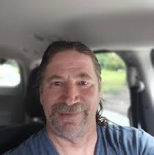 What are good waterfalls and swimming spots with easy access near  Carrollton for a senior pup?