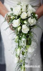 No idea how much wedding flowers cost? Rose Bouquets Auckland Wedding Flowers Roses Wedding Bouquets Best Blooms Florists Henders Cascading Bridal Bouquets Wedding Flowers Rose Wedding Bouquet
