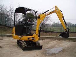Excavator, heavy construction equipment consisting of a boom, dipper, bucket and cab on a rotating platform known as the house. Mini Digger Hire Midi Excavator Hire Ridgway Rentals Ltd