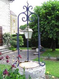 Dessus De Puit Ets Lacoste 24160 Excideuil Dordogne Ferronnerie Decoration Puit Amenagement Jardin Plaques De Cheminee Dordogne