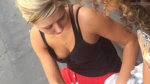 Downblouse teen tease with titties while doing makeup in public ...