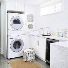 The white wall in the background is left empty, so you can be creative in doing a makeover to the wall. Basement Laundry Room And Snack Bar Design Ideas