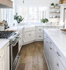 White Kitchen With Off White Cabinets White Marble Quartz Countertop Martha Stewart Cabinet Hardware And Wi Kitchen Renovation Kitchen Marble Kitchen Remodel