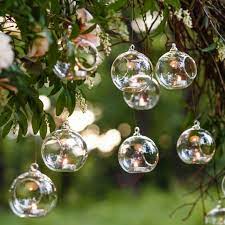 Provide a little flair for any dull room by hanging the stained glass dragon suncatcher. Glass Hanging Tealight Holder Ball 10cmd 12cmh Clear