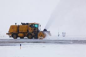 A Snow Blower At Denver International Airport Works To Clear A Runway During The 2012 2013 Winter Season Snow Denver International Airport Snow Blower