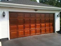Clopay Classic Collection Raised Panel Wood Garage Door In Cedar Factory Finished With Sikkens Butternut Sta Garage Doors Wood Garage Doors Cool House Designs