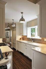 Beautiful Fixtures Illuminate Your Kitchen Go Green With Led Light Bulbs We Have Every Galley Kitchen Remodel Kitchen Remodel Layout Galley Kitchen Design