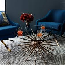 We'd like to suggest west elm's new beanbag coffee table. Starburst Coffee Table