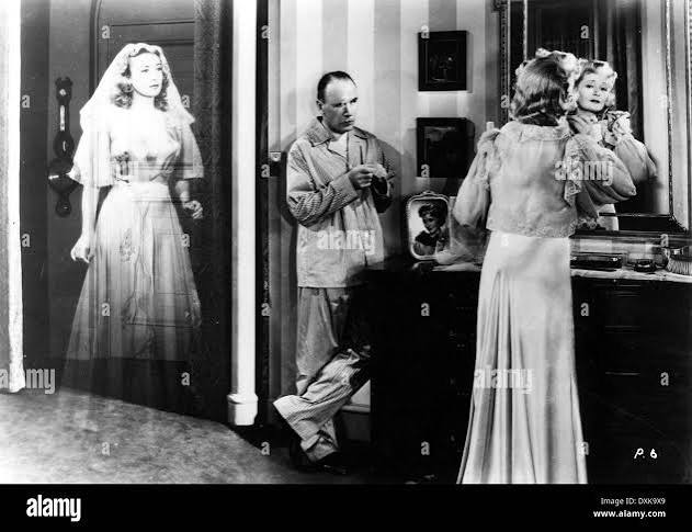TOPPER RETURNS (US1941) JOAN BLONDELL, ROLAND YOUNG Stock Photo - Alamy