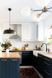 Love the backsplash, beam and pendants in this cheerful blue kitchen. Sealing Butcher Block Countertops Place Of My Taste