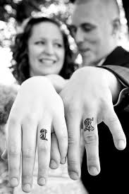 Finger tattoos come in different designs and sizes. Super Cool Engagement And Wedding Ring Tattoo Ideas For Couples