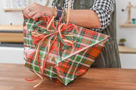 Fold the right and left sides in until they meet in the middle and overlap some. Make A Gift Bag From Leftover Wrapping Paper Hgtv