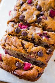 Super Moist And Incredibly Indulgent Brown Sugar Banana Bread With Juicy Raspberries And Dark Chocolate Chips M Banana Bread Recipes Food Nutella Banana Bread