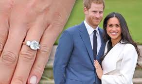 So, the carat weight of meghan markle's engagement ring is approximately 3.8 carats in total, with a three carat cushion cut center stone. Meghan Markle Ordered To Take Engagement Ring Off To Prevent Paparazzi Chaos Royal News Express Co Uk