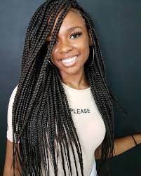 30 Trendy Box Braids Styles Stylists Recommend For 2021 Hair Adviser Box Braids Styling Box Braids Hairstyles Braid Styles