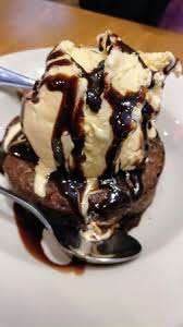 Big ol' brownie chocolate brownie topped with vanilla ice cream and hot chocolate sauce. Dessert Picture Of Texas Roadhouse Doha Tripadvisor