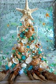 It comes carrying christmas goodies in a green sack. Beach Christmas Decoration Coastal Christmas Decor Etsy Beach Christmas Decorations Coastal Christmas Decor Coastal Christmas