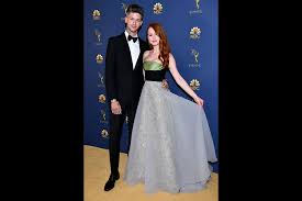 When i was working with brandon to schedule his graduation photos, i suggested we also nab a few photos of him and his girlfriend, lauren. Travis Mills And Madelaine Petsch On The Red Carpet At The 70th Emmy Awards Television Academy