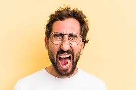 Young crazy man angry expression | Premium Photo
