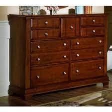 Decorative hardware with a clear lacquer coat. Cottage Triple Dresser 9 Drawers Cherry Finish Bb19 002 Dressers Parrott S Furniture