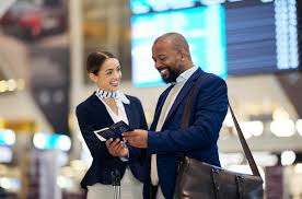 Premium Photo | Businessman airport and passenger assistant helping  traveler in departure flight time or passport information Black male with  female airline service agent for advice on travel directions or FAQ