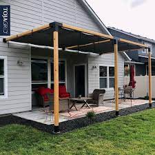 Pin By Jennifer Hardy On For The Home In 2021 Wall Mounted Pergola Shade Sail Pergola Kits