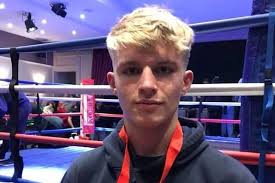 Polished win by boxing's blond bomber Russell