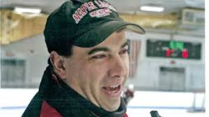 Youth hockey coach charged in graphic child sex case