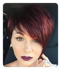 Keep those curls under control by chopping them into a pixie cut your dark raven hair will be bolder than ever when coupled with thick bright red highlights. 40 Red Hair With Red Highlights Ideas Hair Hair Styles Red Hair