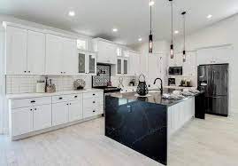 Tiny black handles add less crowd look to the area since it is small. Black Quartz Countertops Design Ideas Designing Idea