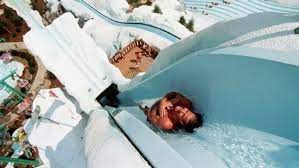 18 Of The Coolest Water Slides From Around The World Cool Water Slides Water Slides Disney Blizzard Beach
